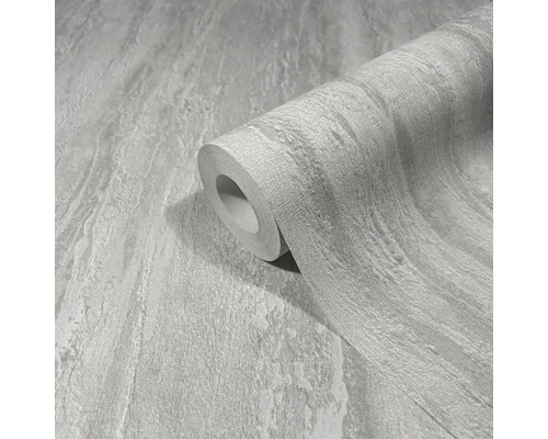 Eine Rolle Tapete mit Steinmuster.