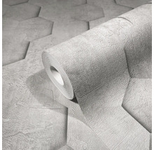 Un rouleau de papier peint avec motif géométrique