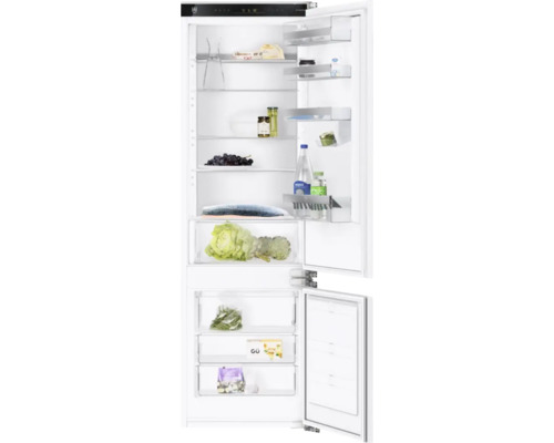 V-ZUG CombiCooler V4000 178NI Einbau Kühlgefrierkombination BxHxT 54.8x177.7x54.5 cm Türanschlag rechts 5110800000 Geöffneter Kühlschrank mit Lebensmitteln auf den Regalen