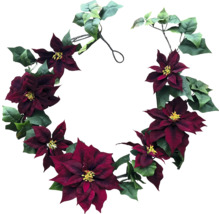 Couronne d''étoiles de Noël avec feuilles vertes
