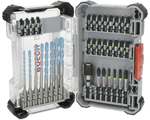 Jeu de forets et d''embouts dans une boîte à outils ouverte