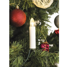 Gros plan d''un arbre de Noël avec décorations et guirlande de bougies