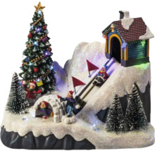 Village miniature de Noël avec sapin, igloo et piste de luge