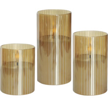Trois verres cylindriques côtelés avec bougies LED