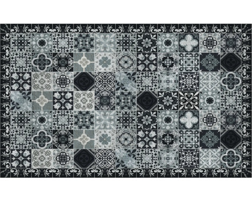 Teppich mit Fliesenmuster und dekorativem Rand