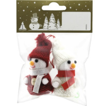 Zwei Schneemannfiguren als Weihnachtsbaumschmuck in einer Verpackung.
