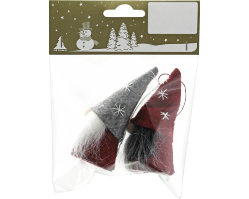 Zwei dekorative Zwerge mit Mützen und Bärten in einer Verpackung