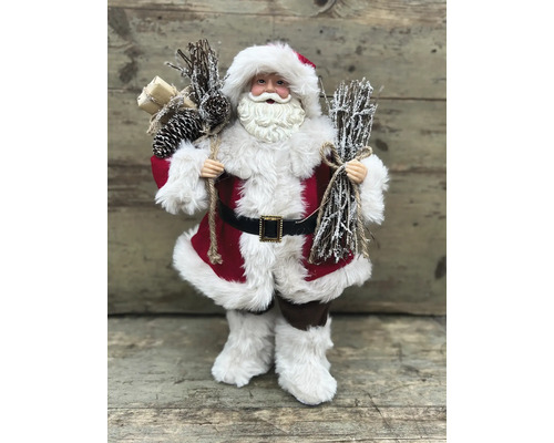 Père Noël décoratif avec des brindilles et des cadeaux pour les décorations de Noël