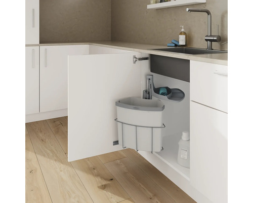 Évier de cuisine avec poubelle intégrée et support pour produits de nettoyage