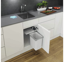 Évier de cuisine avec poubelle intégrée dans une armoire blanche