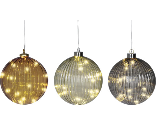 Drei dekorative Weihnachtskugeln mit LED-Beleuchtung.