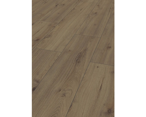 Gros plan d'un sol stratifié aspect bois