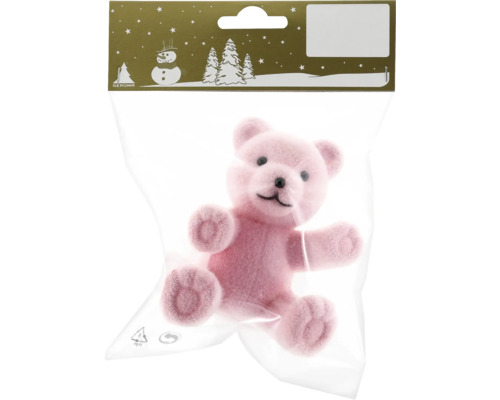 Ours en peluche rose comme article de décoration dans un emballage plastique