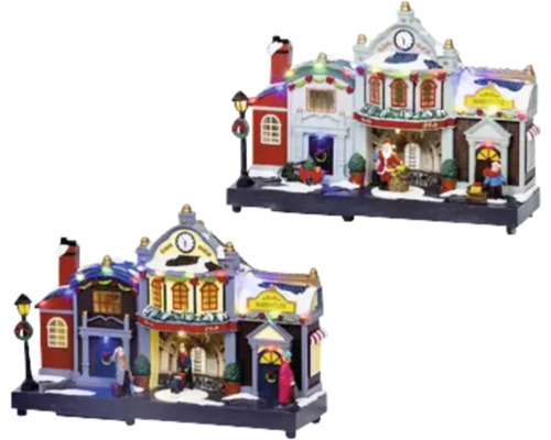 Zwei weihnachtliche Häuser mit Figuren und Beleuchtung.