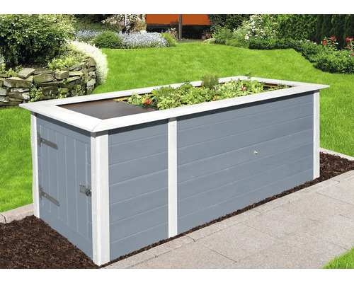 Jardinière surélevée avec fonction de porte dans le jardin