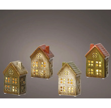 Quatre maisons décoratives en céramique avec ouvertures de fenêtres pour bougies chauffe-plat