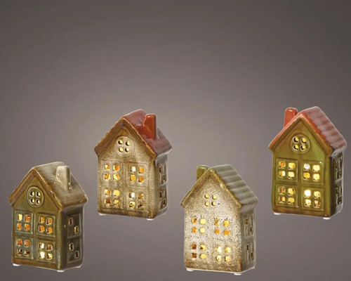 Quatre maisons décoratives en céramique avec ouvertures de fenêtres pour bougies chauffe-plat