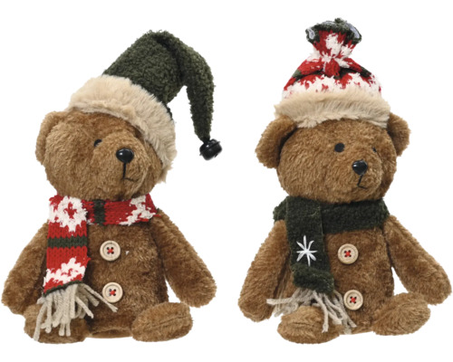 Deux ours en peluche avec bonnet et écharpe comme décoration hivernale