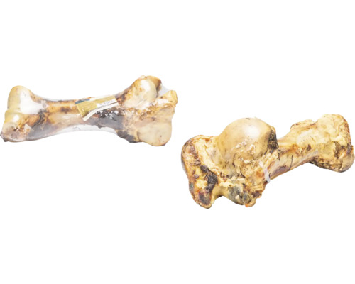 Deux os de bœuf, dont un emballé dans du film, pour chiens