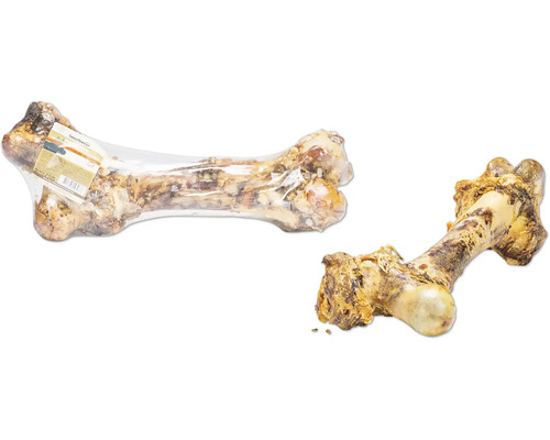 Zwei Hundeknochen, einer verpackt, der andere ausgepackt