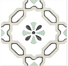 Carreau décoratif avec motif géométrique et floral