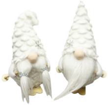 Deux lutins de Noël blancs comme décoration