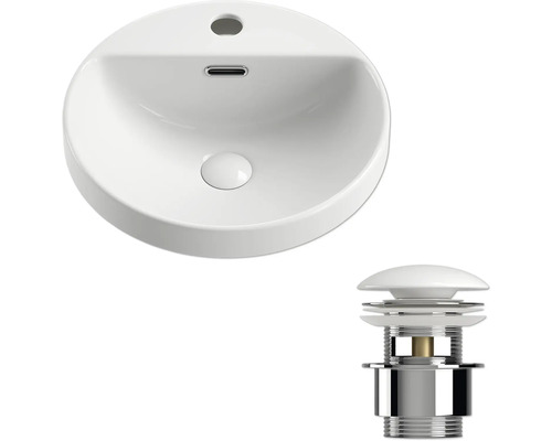 Lavabo en céramique et garniture de vidange pour une salle de bains.