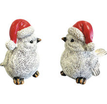 Deux figurines décoratives d''oiseaux avec des bonnets de Noël pour la décoration de Noël