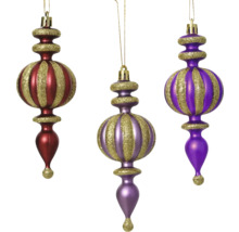 Drei gestreifte Weihnachtskugeln als Christbaumschmuck