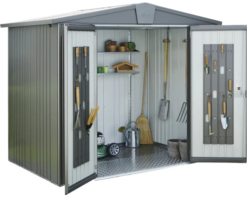 Abri de jardin métallique ouvert avec outils de jardinage