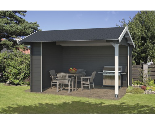 Abri de jardin en bois avec barbecue et meubles de jardin sur pelouse