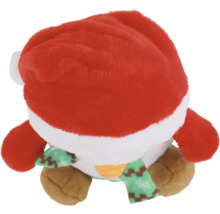Pingouin de Noël en peluche avec bonnet et écharpe comme décoration