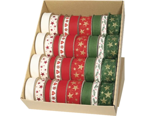 Différents rouleaux de ruban de papier cadeau avec des motifs dans une boîte