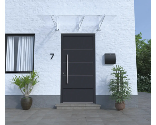 Façade de maison avec porte d''entrée, boîte aux lettres et plantes