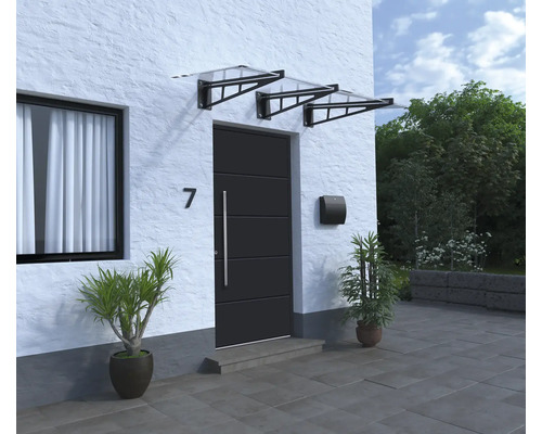 Zone d''entrée d''une maison avec marquise de porte et boîte aux lettres