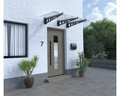 Hausfassade mit Haustür, Briefkasten und zwei Vordächern aus Glas