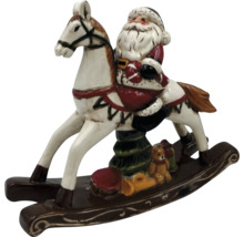 Décoration Père Noël sur cheval à bascule