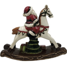 Décoration de Noël : le Père Noël sur un cheval à bascule avec un arbre de Noël et des cadeaux.