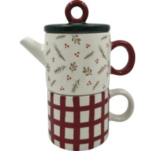 Théière avec tasse, empilées l''une sur l''autre