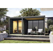 Pavillon de jardin avec sauna et coin salon sur une terrasse avec jardin