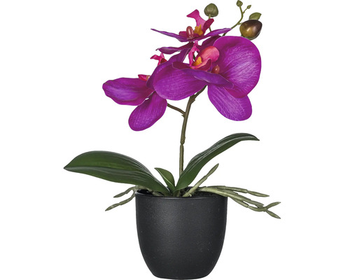 Künstliche lila Orchidee im schwarzen Topf