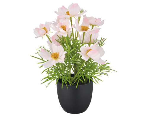 Kunstpflanze im Topf mit hellen Blüten