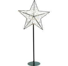 Dekorativer Stern mit Beleuchtung auf einem schwarzen Ständer