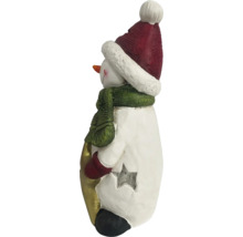 Figurine de bonhomme de neige avec bonnet et écharpe comme décoration de Noël
