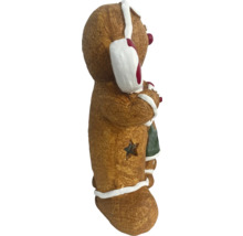 Figurine bonhomme en pain d''épices avec découpe en étoile comme décoration