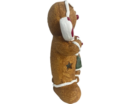 Figurine bonhomme en pain d''épices avec découpe en étoile comme décoration