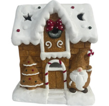 Dekoratives Lebkuchenhaus mit Zwergfigur zur Weihnachtszeit