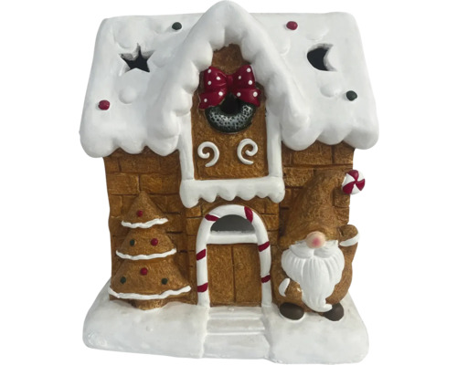 Dekoratives Lebkuchenhaus mit Zwergfigur zur Weihnachtszeit
