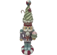 Casse-noisette décoratif en forme de friandise pour la période de Noël
