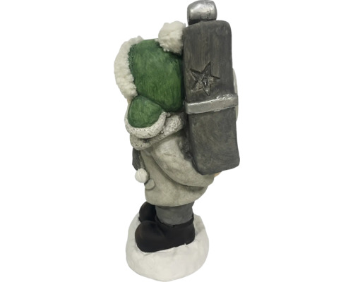 Dekorative Winterfigur eines Jungen mit Weihnachtsgeschenk